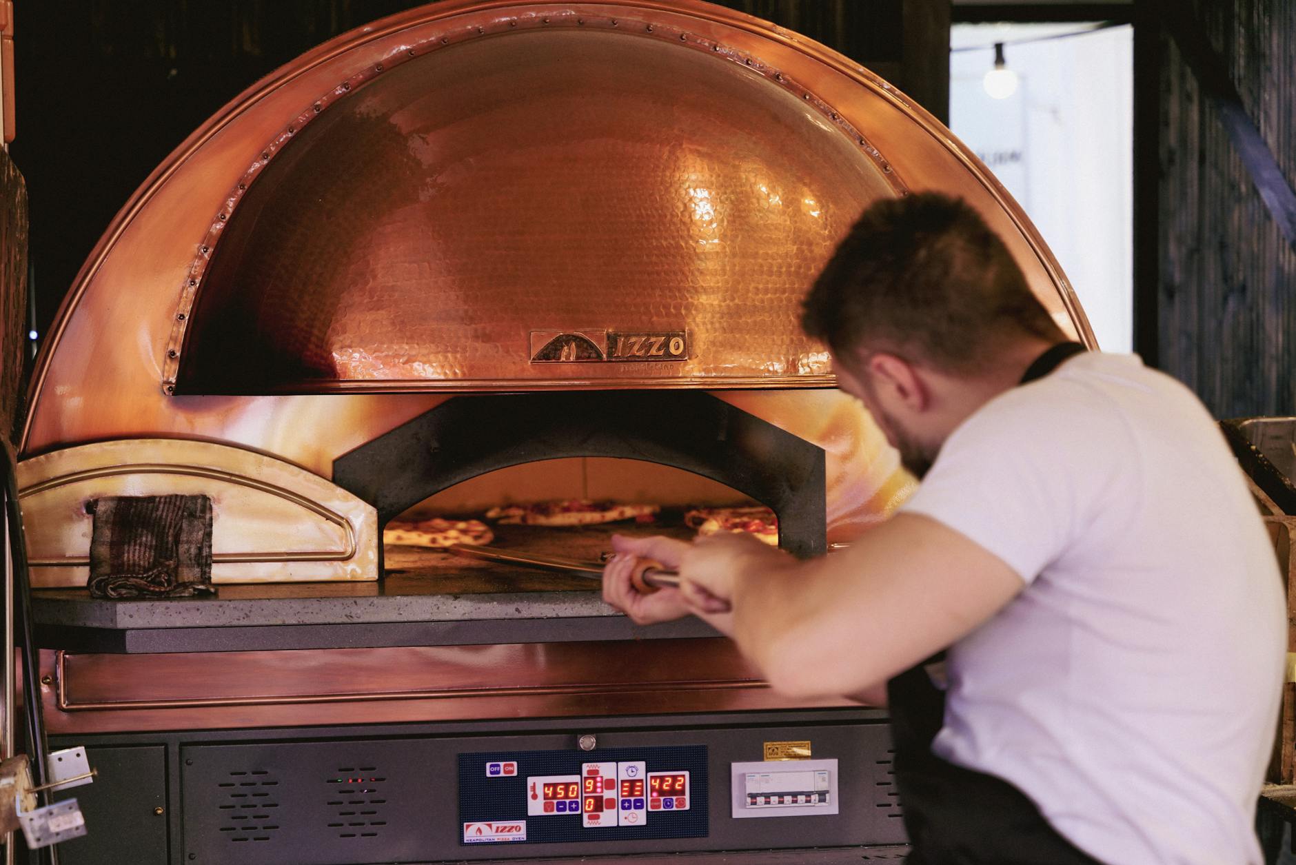Logo pizzerii Gowid Lębork lub zdjęcie wnętrza lokalu z uśmiechniętym personelem